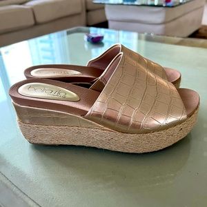Gold wedge slip ons, size 7 US. Like new.